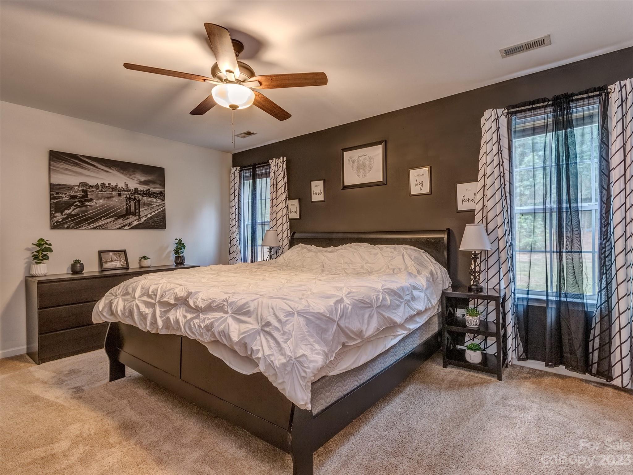1051 Duckwood Road Lancaster, SC 29720 - Photo 11 of 18 a large bed sitting in a bedroom next to a window