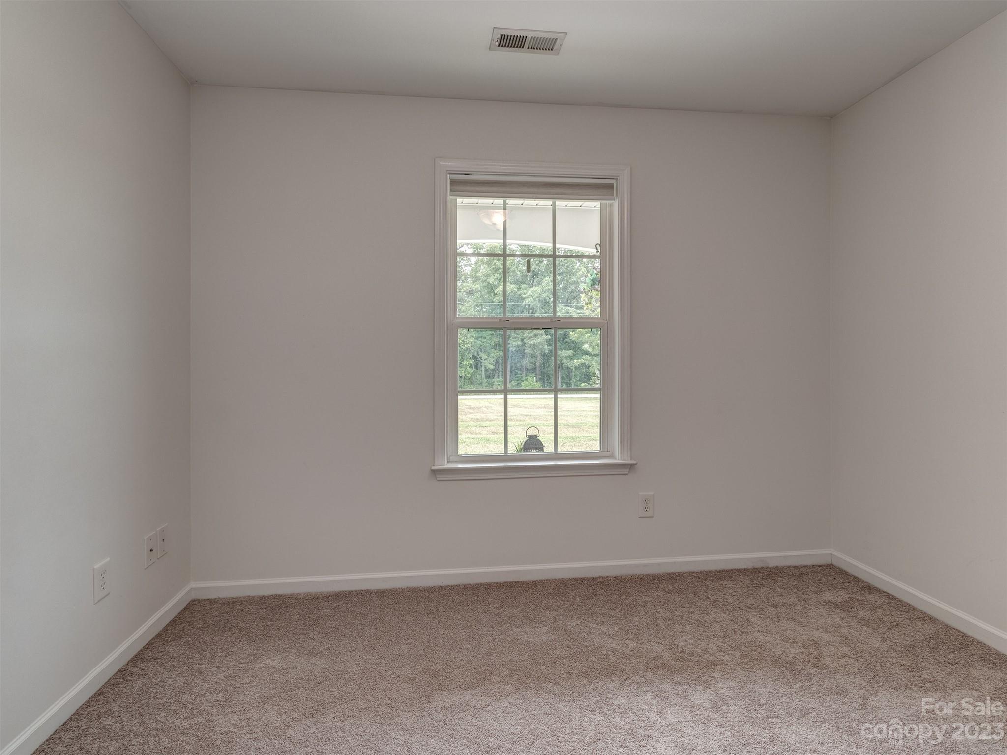1051 Duckwood Road Lancaster, SC 29720 - Photo 14 of 18 an empty room with a window