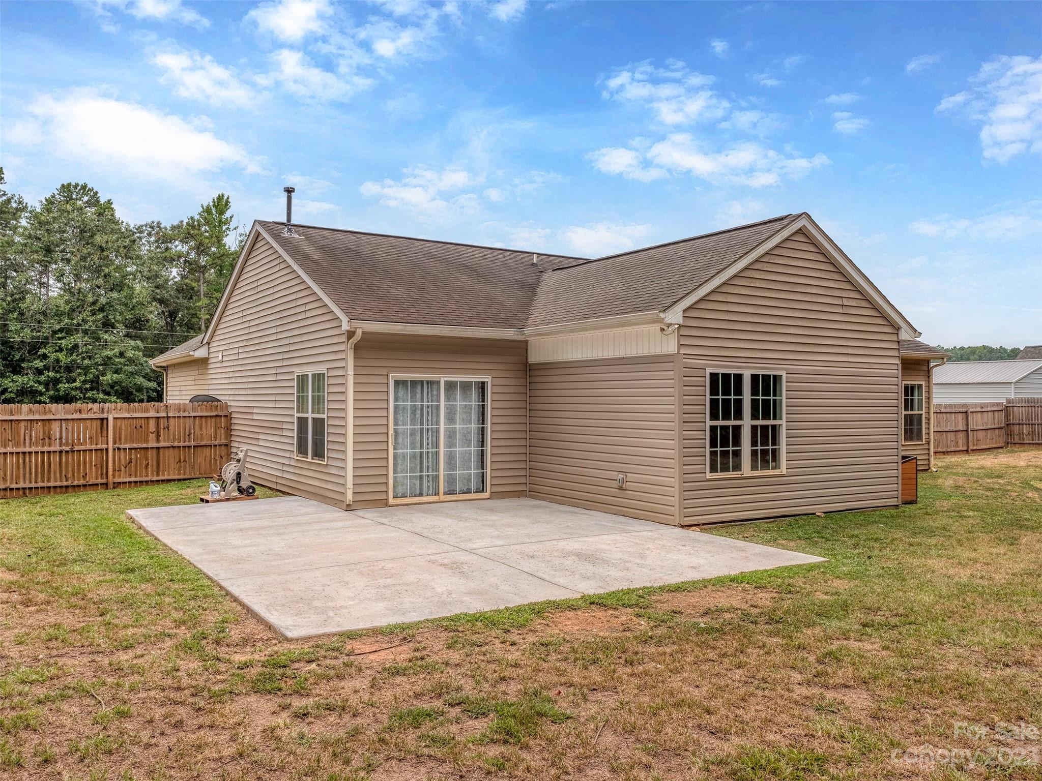 1051 Duckwood Road Lancaster, SC 29720 - Photo 16 of 18 a view of a house with a yard and garage