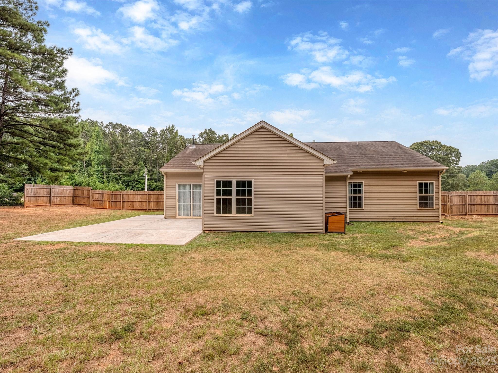 1051 Duckwood Road Lancaster, SC 29720 - Photo 18 of 18 a view of a yard in front of a house with large trees
