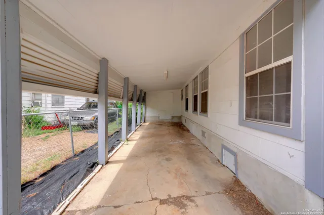 a view of a house with a large window