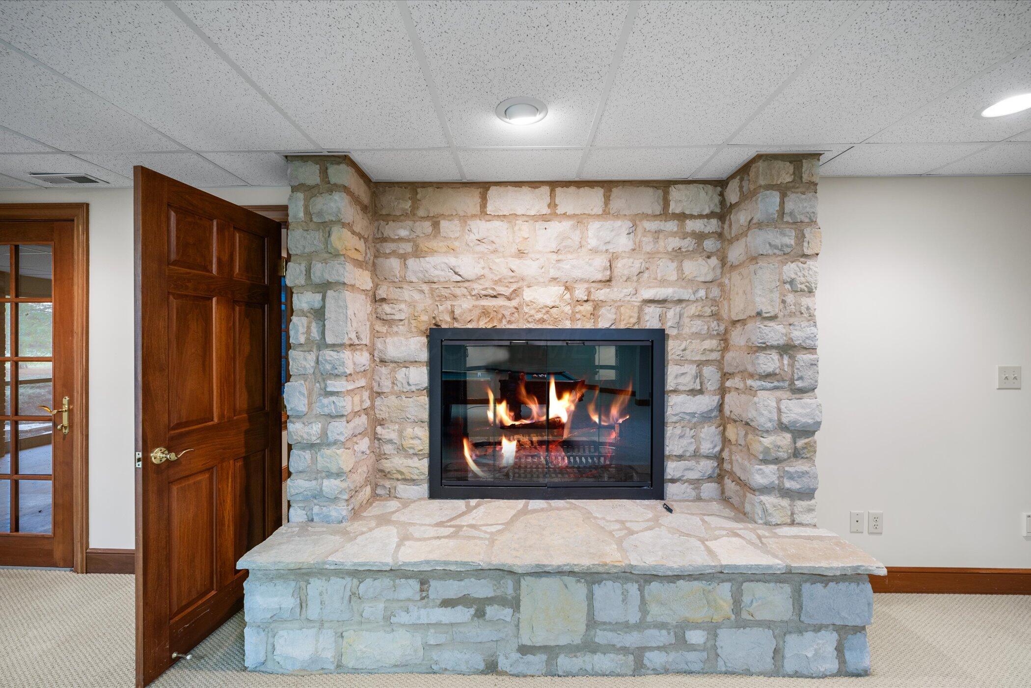 18261 Boerger Road Marysville, OH 43040 - Photo 67 of 94 Floor to ceiling stone fireplace - 2 sided with office.