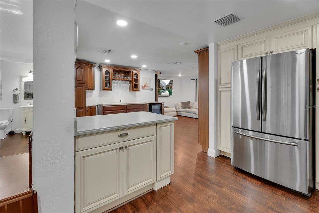 115 Juan Road DeBary, FL 32713 - Photo 15 of 41 a kitchen with stainless steel appliances a refrigerator and a sink