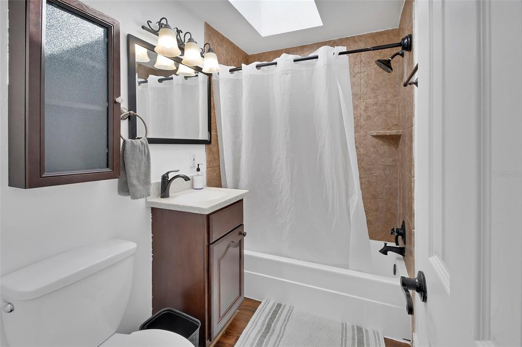 115 Juan Road DeBary, FL 32713 - Photo 23 of 41 a bathroom with a sink toilet and shower