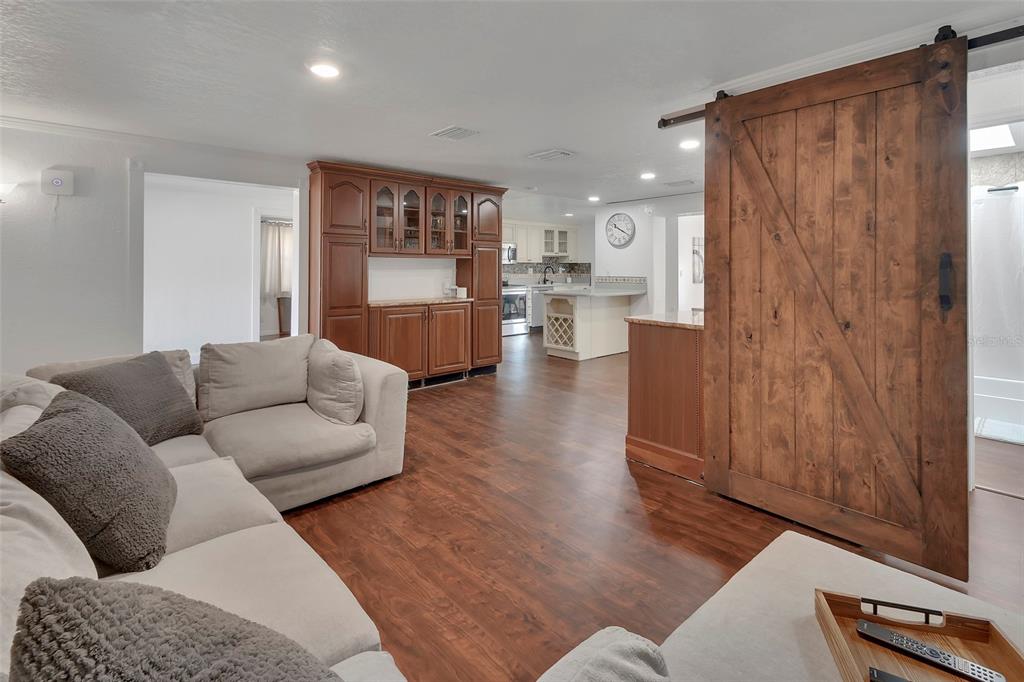 115 Juan Road DeBary, FL 32713 - Photo 5 of 41 a living room with furniture and a area
