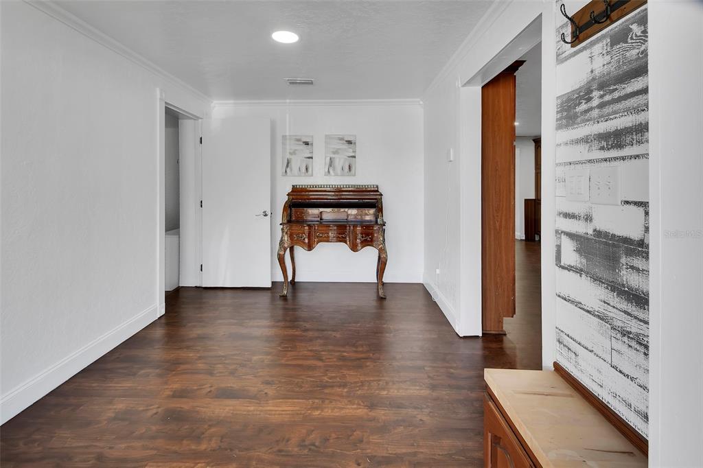 115 Juan Road DeBary, FL 32713 - Photo 6 of 41 a view of an entryway with wooden floor