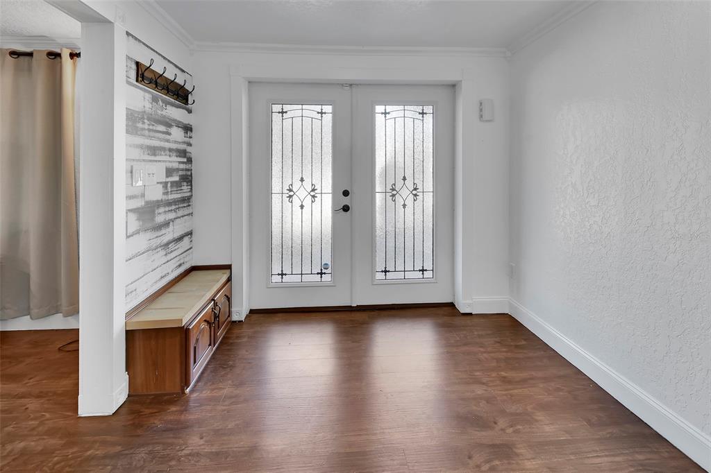 115 Juan Road DeBary, FL 32713 - Photo 7 of 41 an empty room with wooden floor and windows