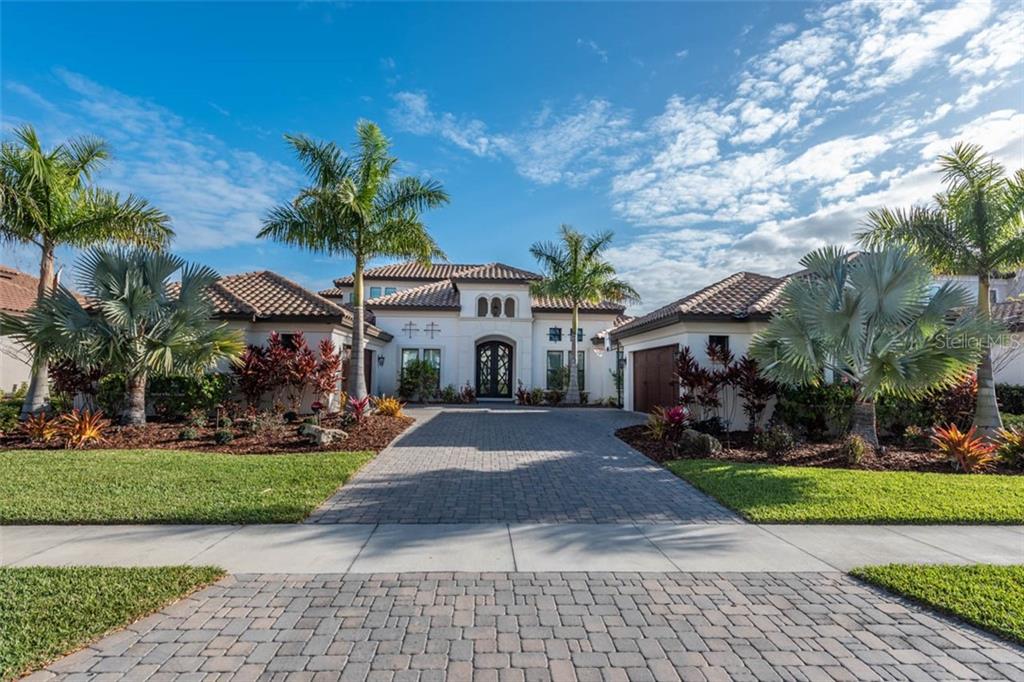 14920 Fishhawk Preserve Drive Lithia, FL 33547 - Photo 1 of 1 a front view of a house with garden