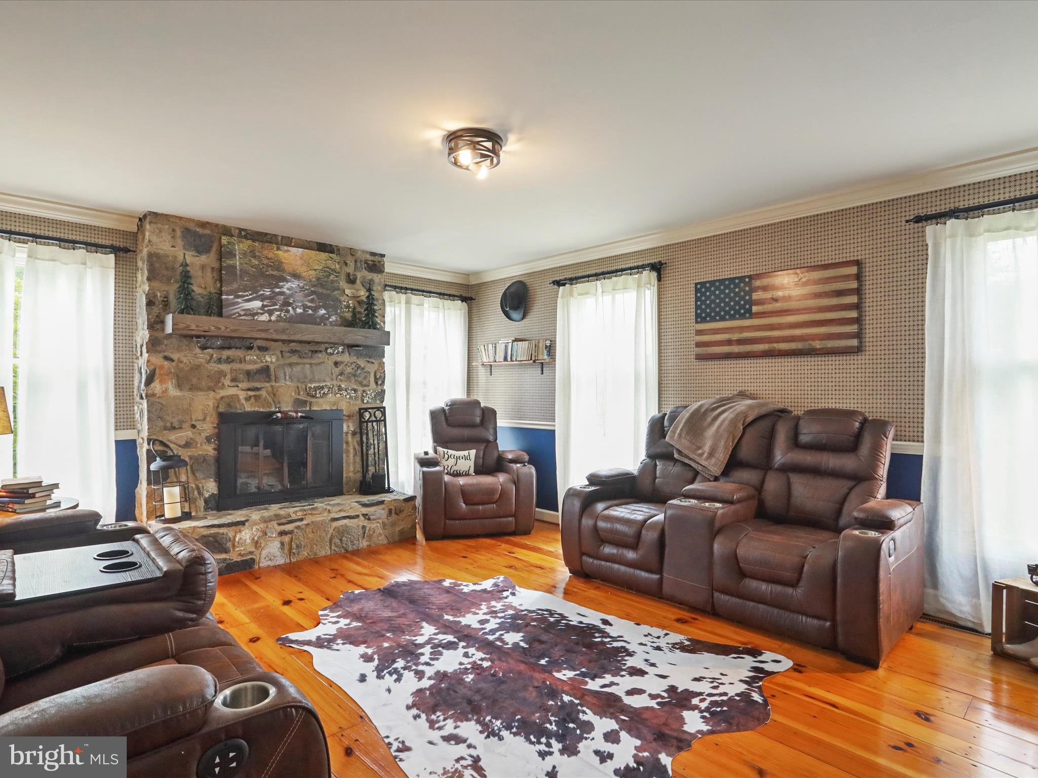 535 Bowling View Road Front Royal, VA 22630 - Photo 28 of 53 a living room with furniture windows and a fireplace