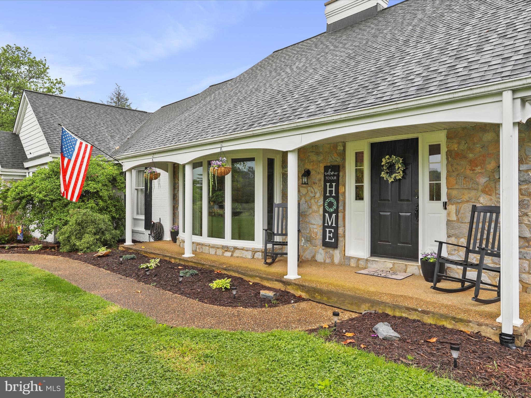 535 Bowling View Road Front Royal, VA 22630 - Photo 3 of 53 a front view of a house with garden