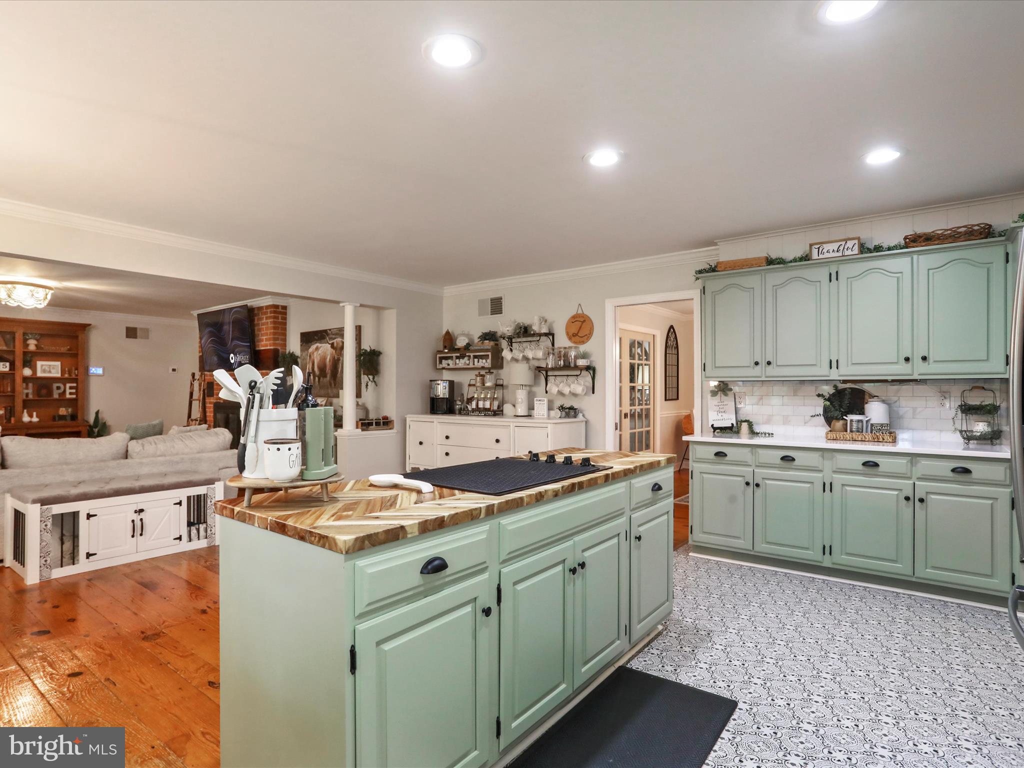535 Bowling View Road Front Royal, VA 22630 - Photo 5 of 53 a kitchen that has a lot of cabinets in it and wooden floors