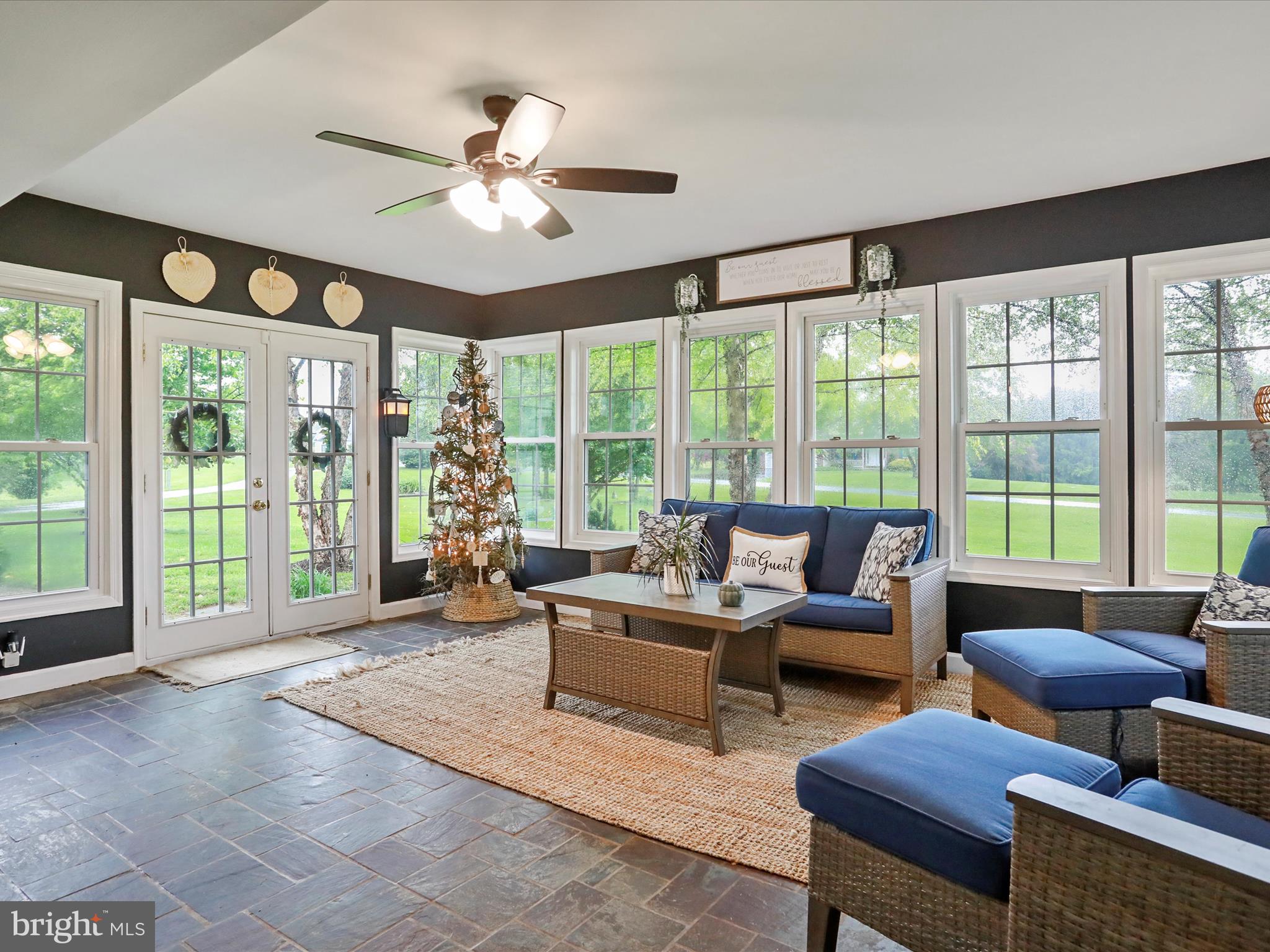 535 Bowling View Road Front Royal, VA 22630 - Photo 51 of 53 a living room with furniture and large windows