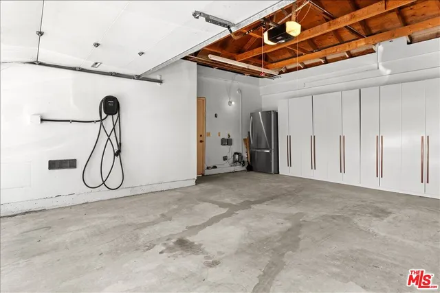 a view of a car parked in front of a house