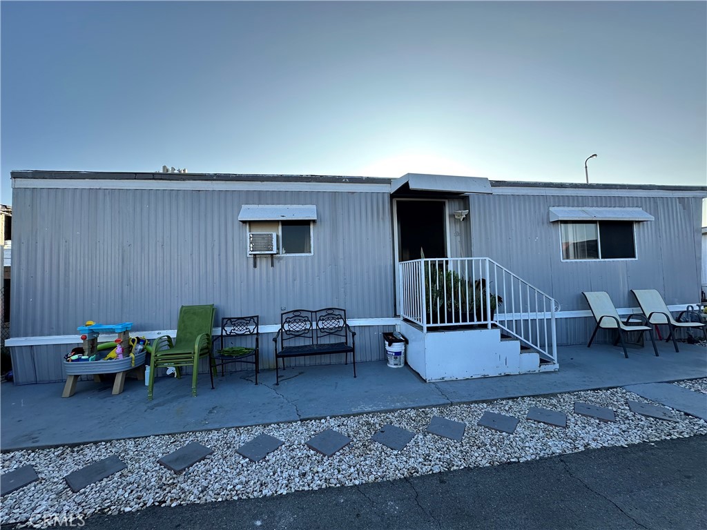 1517 Merced Avenue, Unit 43 El Monte, CA 91733 - Photo 2 of 7 a view of a livingroom with furniture and wooden floor