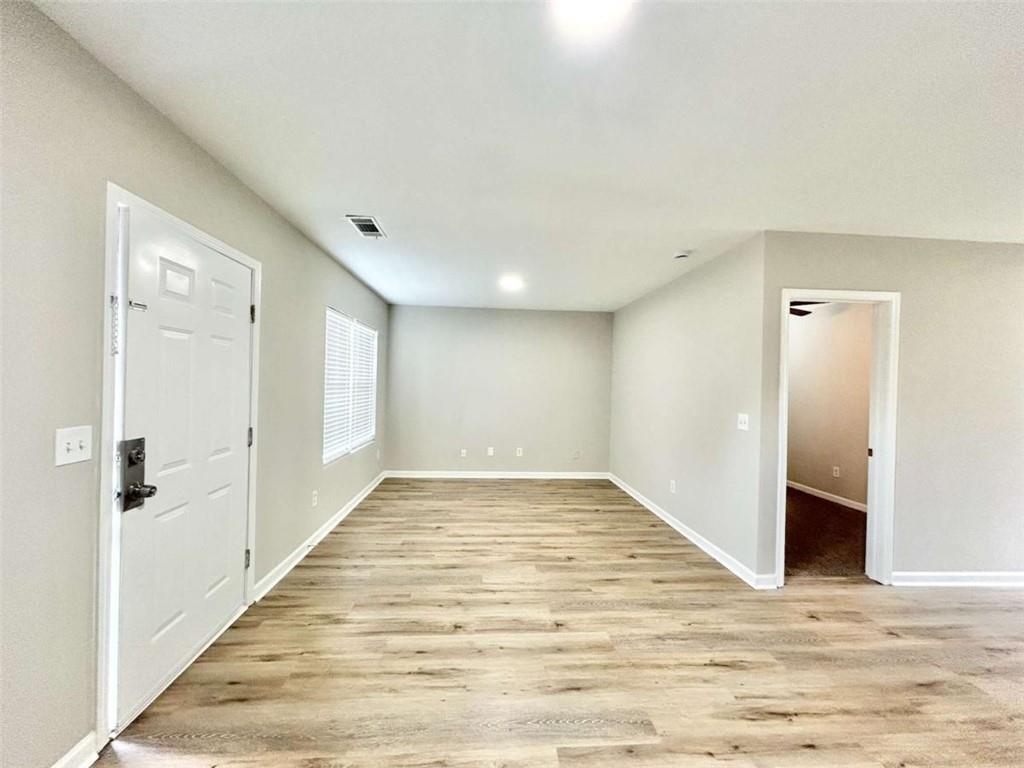 739 Wheel House Lane, Unit A Monroe, GA 30655 - Photo 2 of 17 a view of an empty room