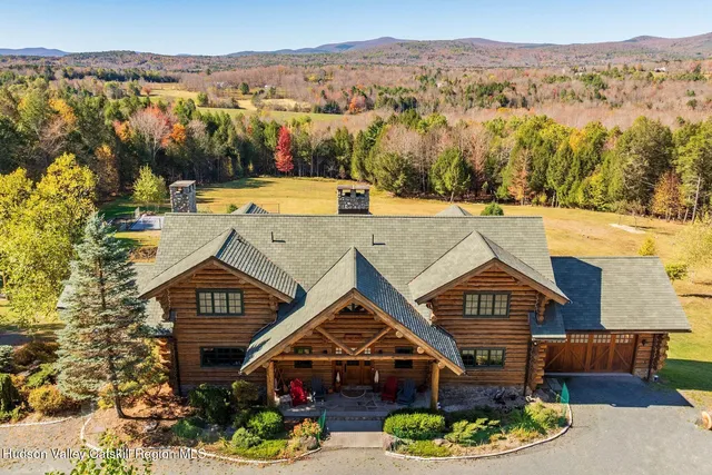 a stove top oven sitting inside of a kitchen