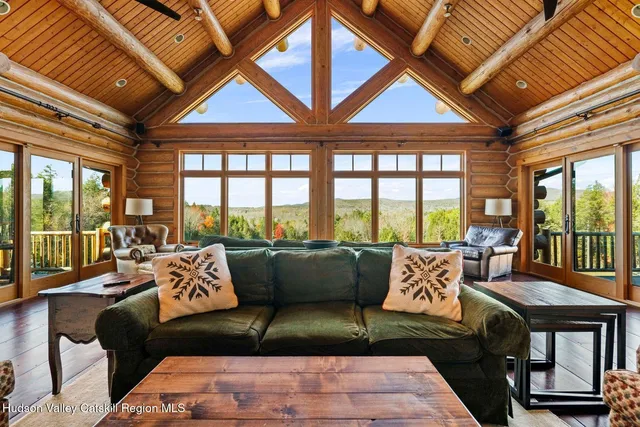 a bedroom with a bed and a table