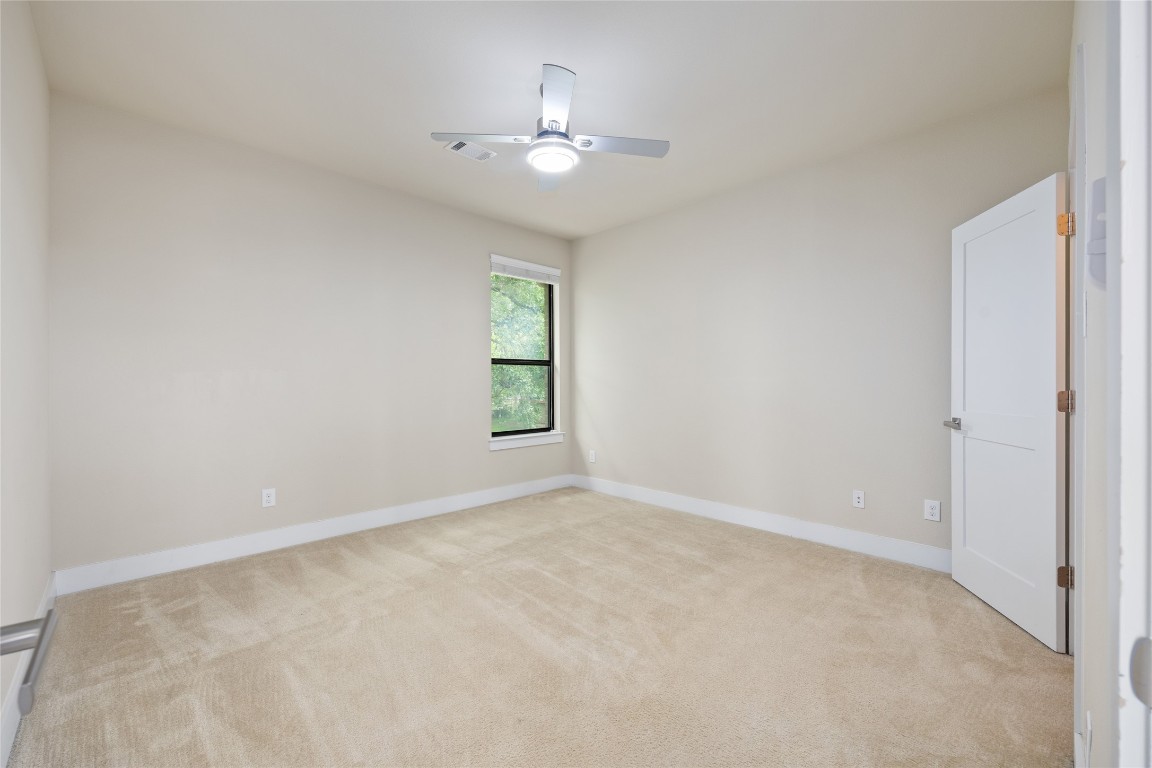 405 Penny Kathleen Court Austin, TX 78717 - Photo 27 of 30 a view of an empty room with a window