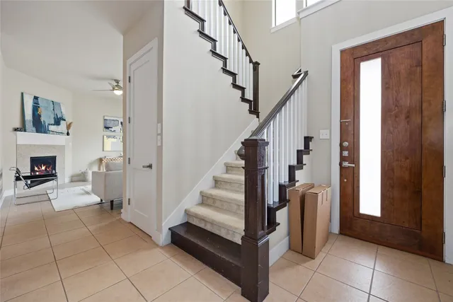 a view of entryway and hall with a rug