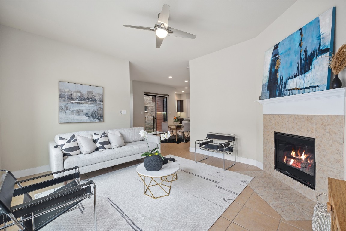 405 Penny Kathleen Court Austin, TX 78717 - Photo 7 of 30 a living room with furniture and a fireplace