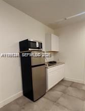 1610 Northwest 53rd Street, Unit 1 Miami, FL 33142 - Photo 3 of 10