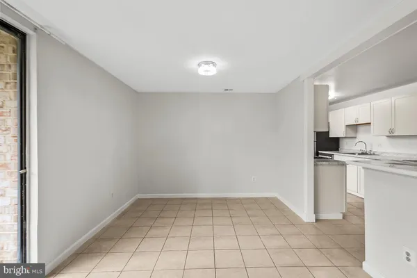 a view of a kitchen with a sink