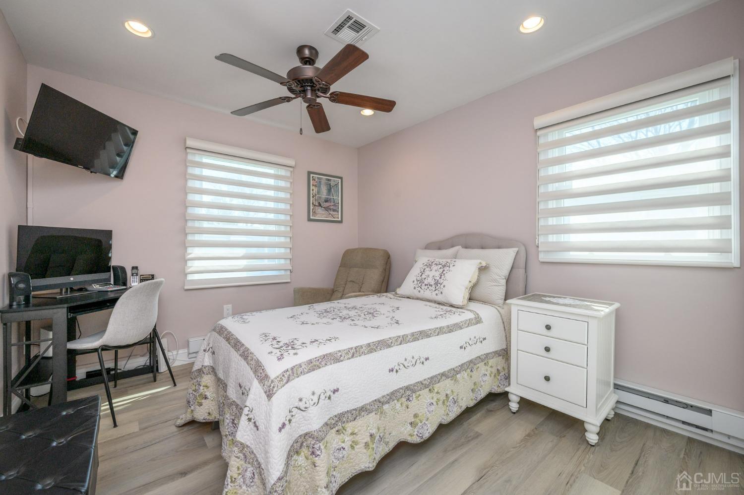3 Bow Drive Brick, NJ 08723 - Photo 21 of 36 a bedroom with a bed and a flat screen tv