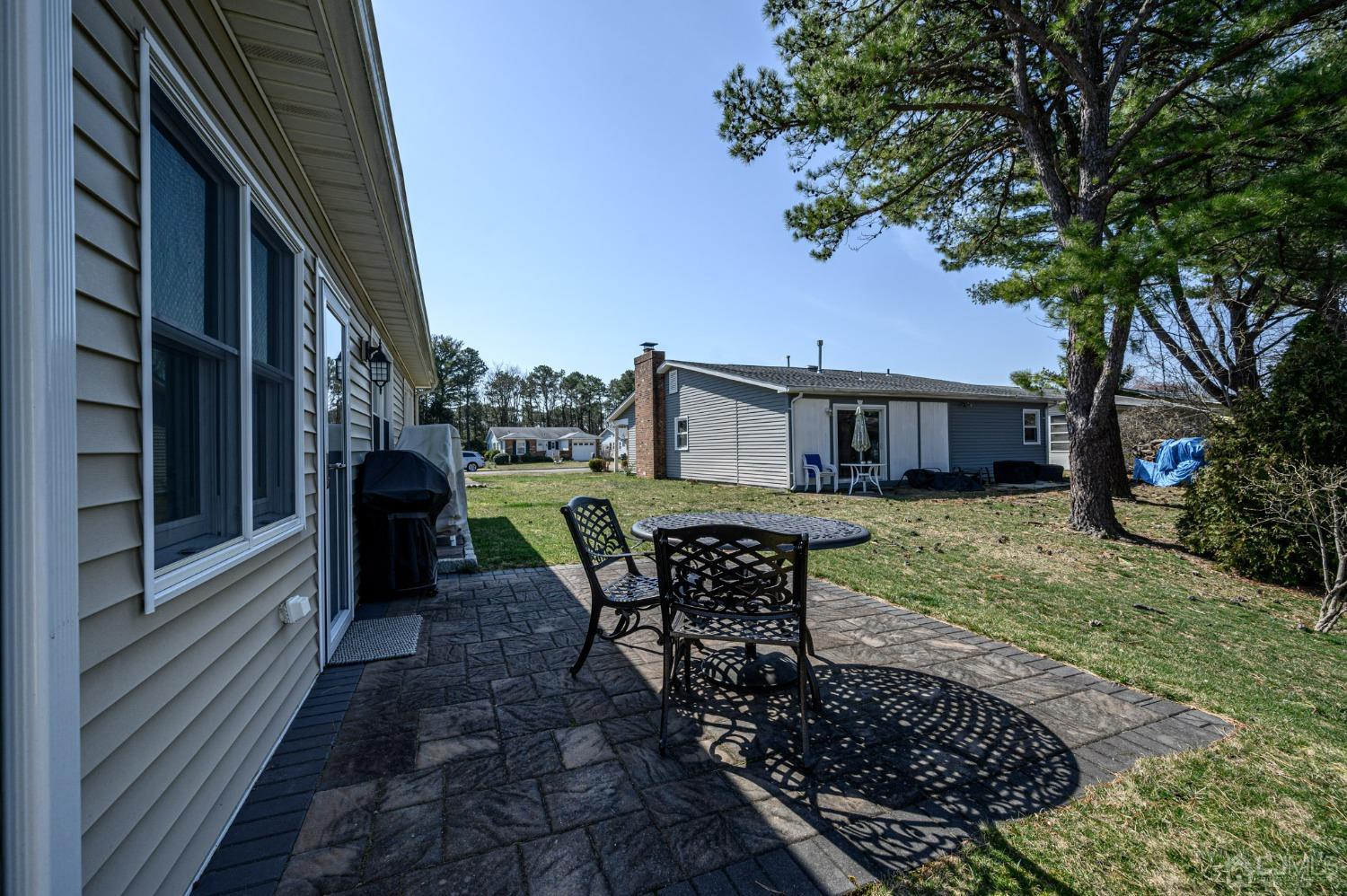 3 Bow Drive Brick, NJ 08723 - Photo 26 of 36 a view of a house with backyard and sitting area