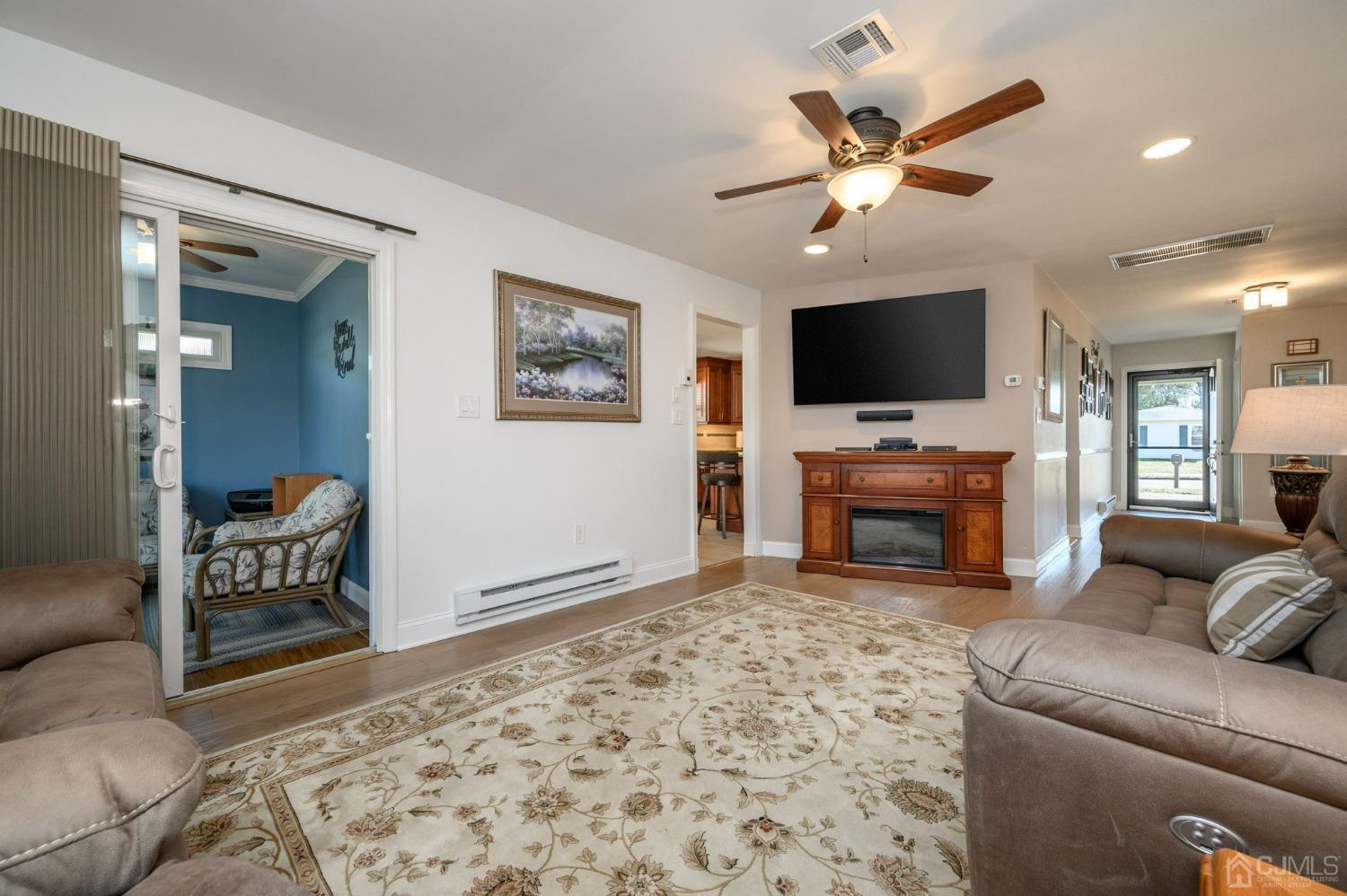 3 Bow Drive Brick, NJ 08723 - Photo 6 of 36 a living room with furniture and a flat screen tv
