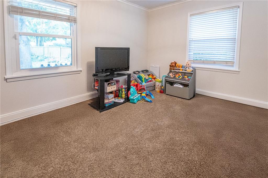 357 Carley Avenue Sharon, PA 16146 - Photo 17 of 32 a view of a livingroom with furniture and a flat screen tv