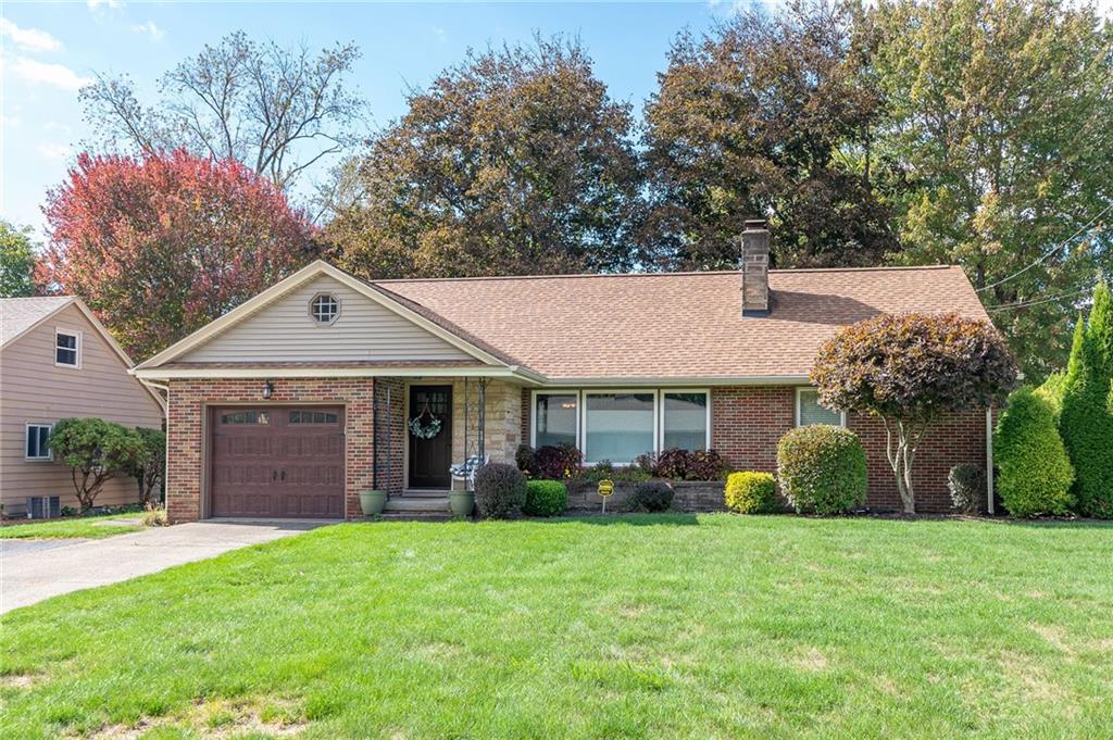 357 Carley Avenue Sharon, PA 16146 - Photo 2 of 32 a front view of a house with a garden and yard