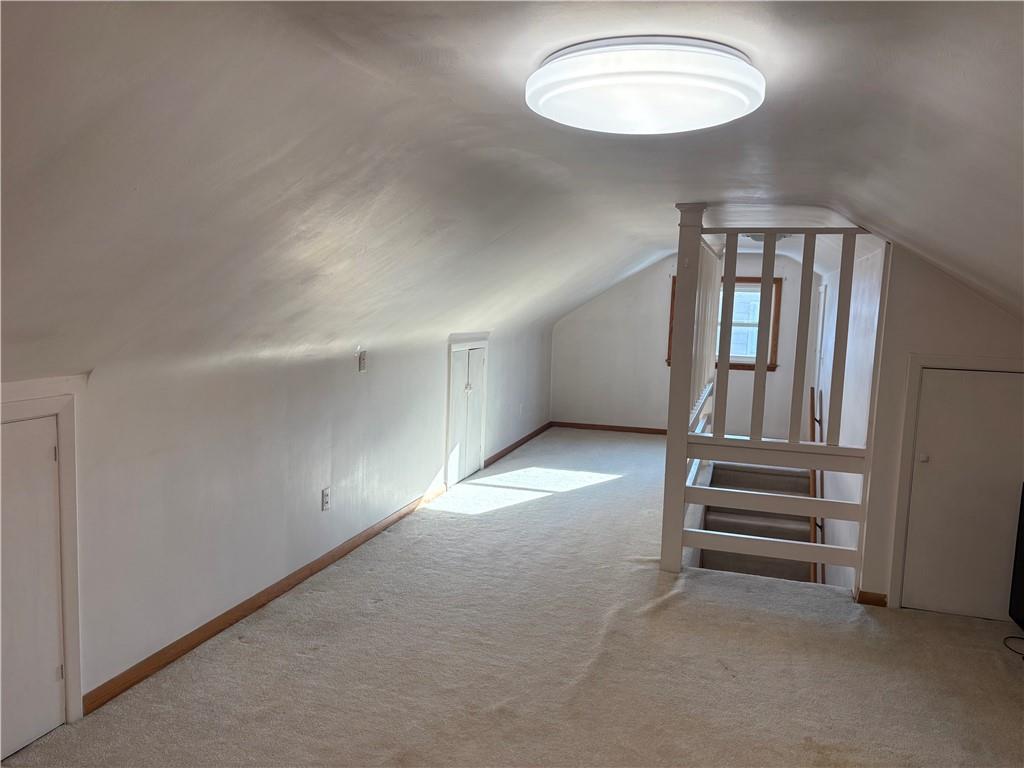 357 Carley Avenue Sharon, PA 16146 - Photo 23 of 32 an empty room with wooden floor and windows
