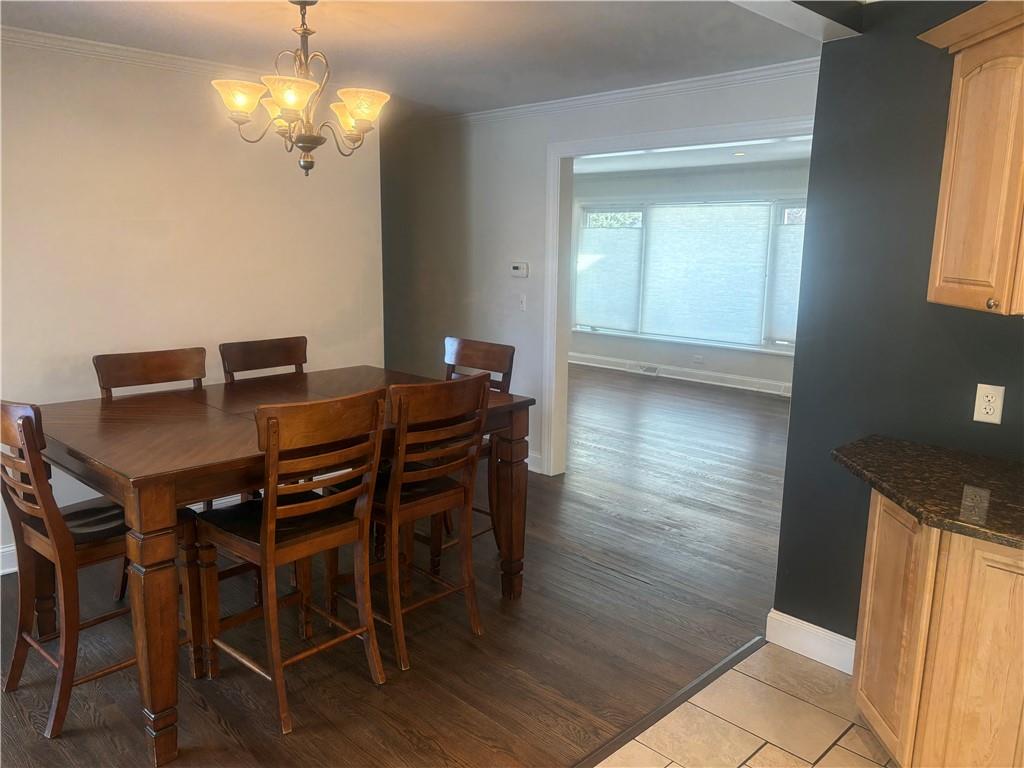 357 Carley Avenue Sharon, PA 16146 - Photo 9 of 32 a view of a dining room with furniture and chandelier