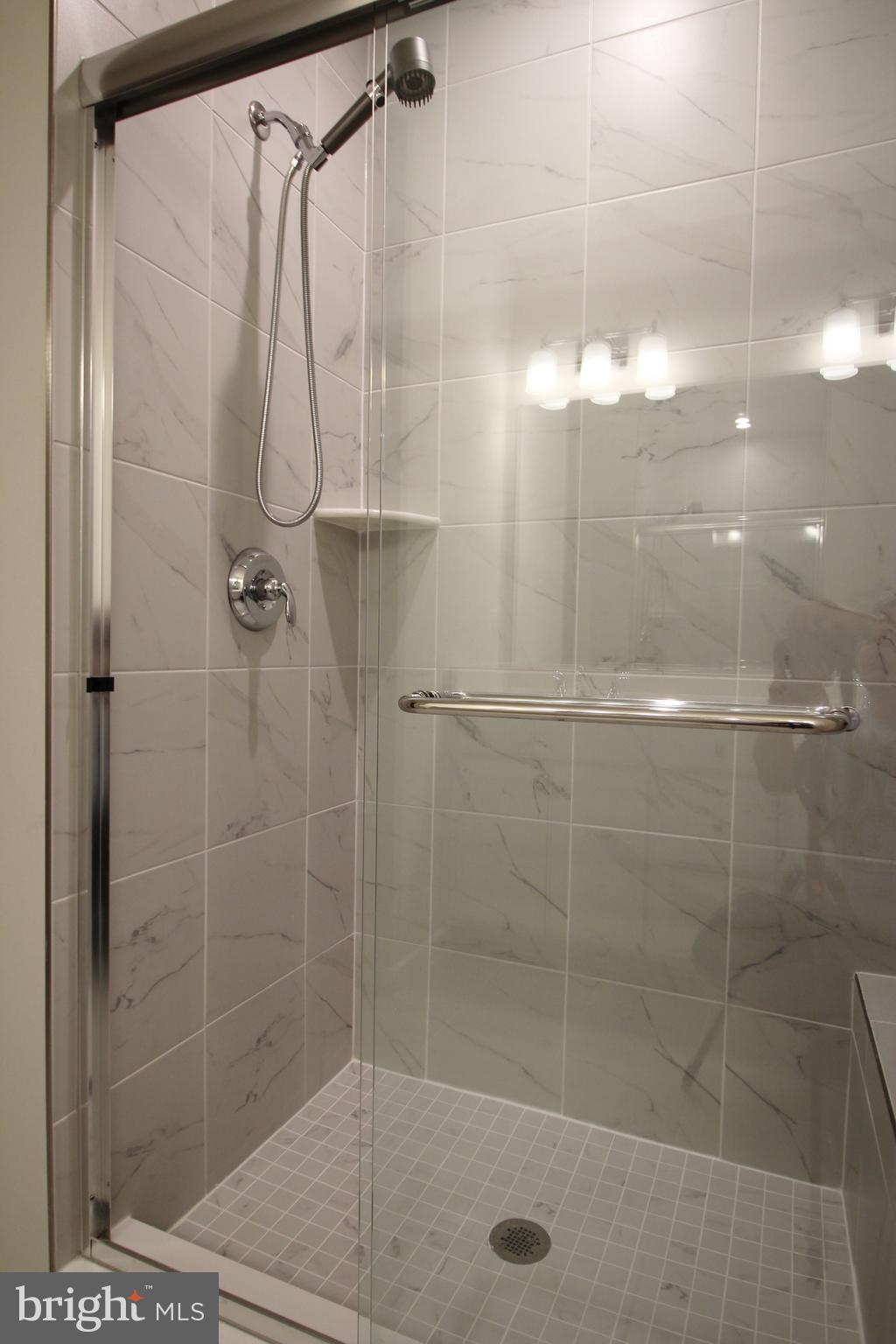 2154 Glacier Road, Unit 67 Herndon, VA 20170 - Photo 21 of 30 a bathroom with a shower