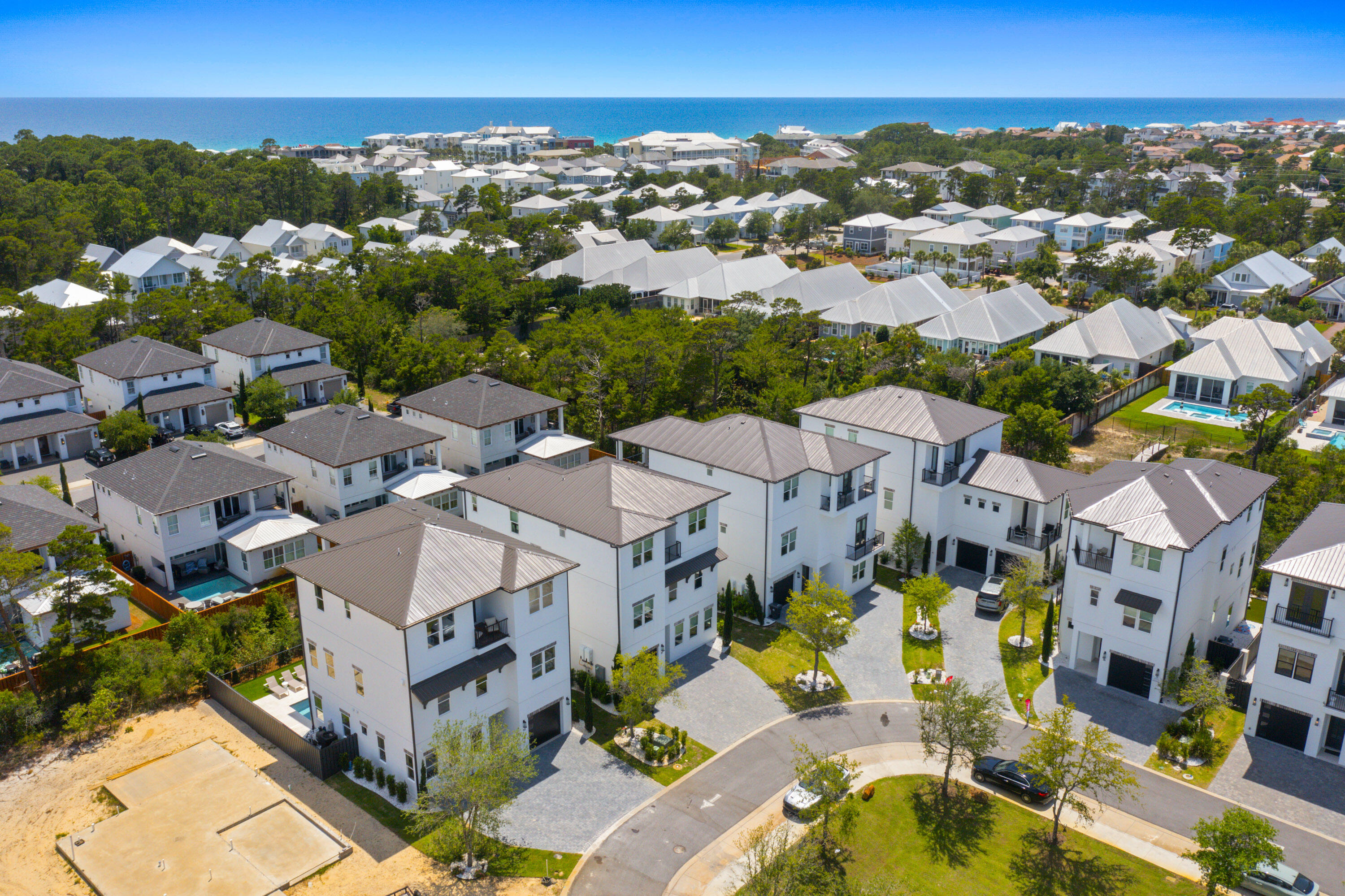 56 Sea Croft Cove Santa Rosa Beach, FL 32459 - Photo 62 of 65 an aerial view of residential houses with outdoor space