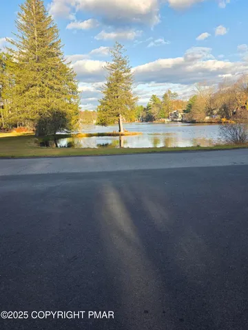 a view of a lake from a yard