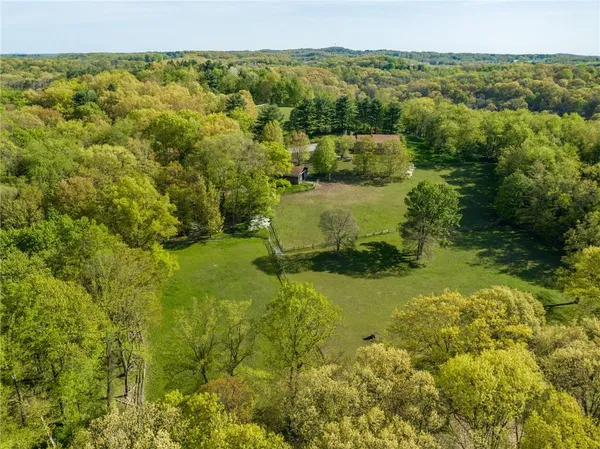a view of a yard with an outdoor space