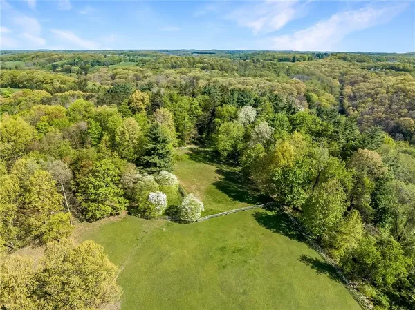 a view of a yard with an outdoor space and seating area