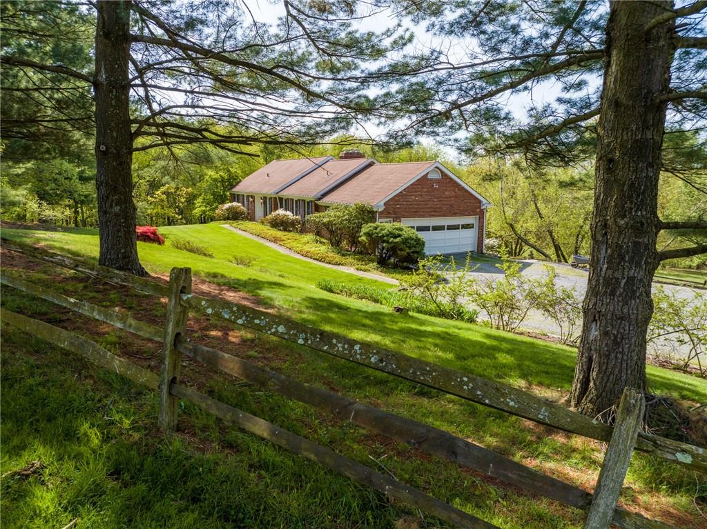 45 Stonedale Road Sewickley, PA 15143 - Photo 17 of 28 a front view of house with yard and green space
