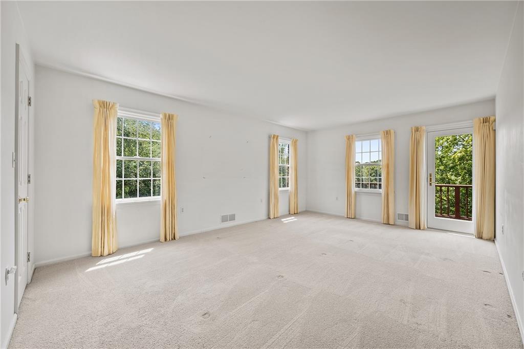 45 Stonedale Road Sewickley, PA 15143 - Photo 25 of 28 a view of an empty room with windows and closet
