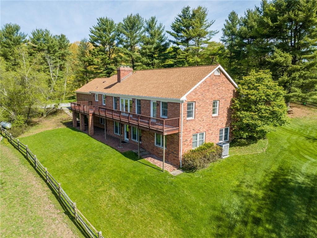 45 Stonedale Road Sewickley, PA 15143 - Photo 26 of 28 a aerial view of a house with swimming pool next to a yard