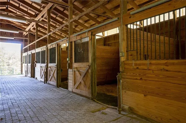 a view of water heater room with stairs