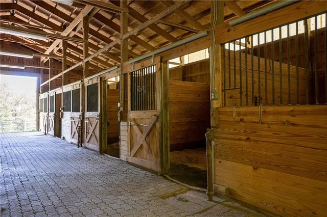a view of water heater room with stairs