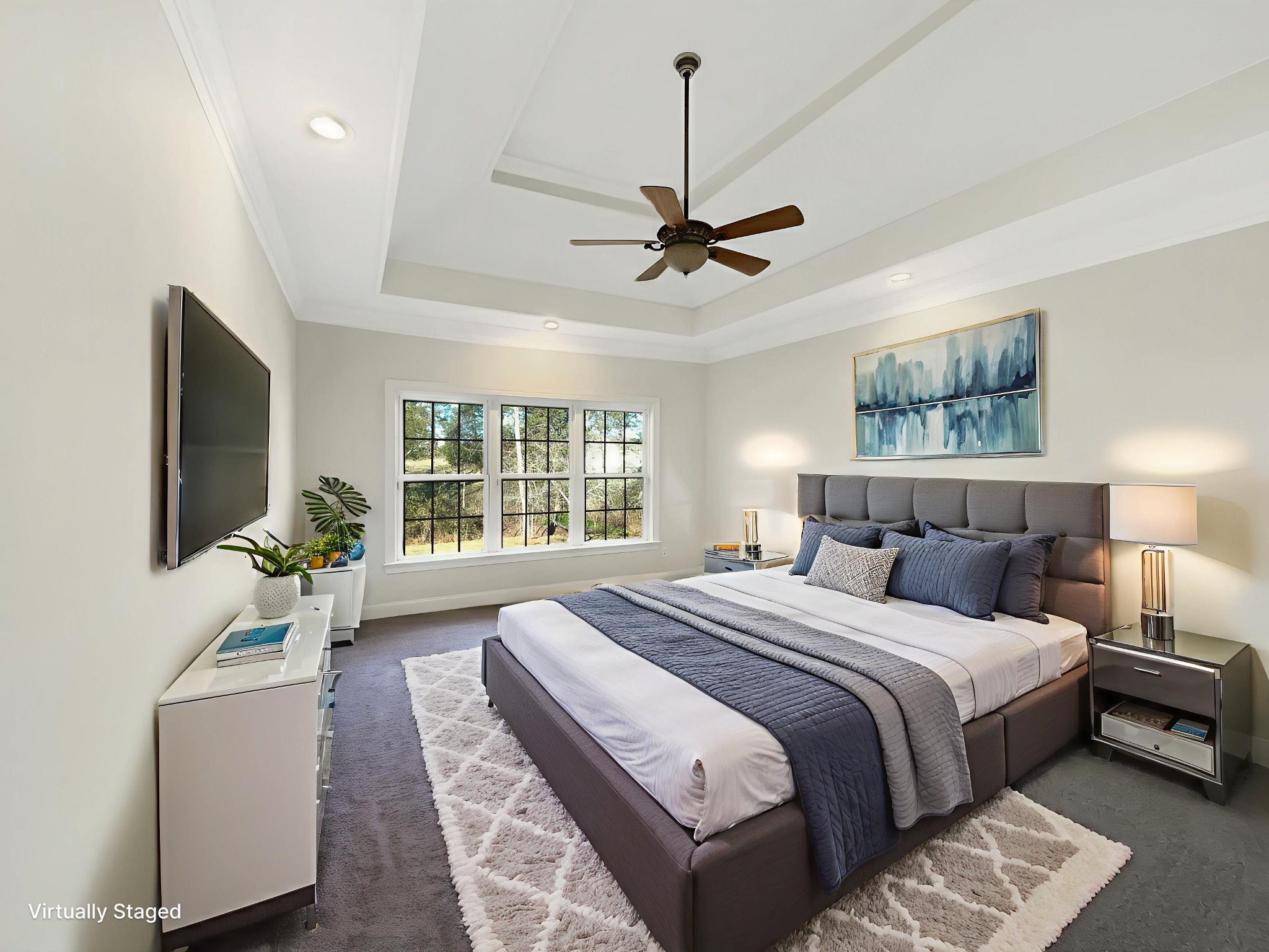 7302 Kempton Court Fairview, TN 37062 - Photo 12 of 28 a spacious bedroom with a large bed and a chandelier