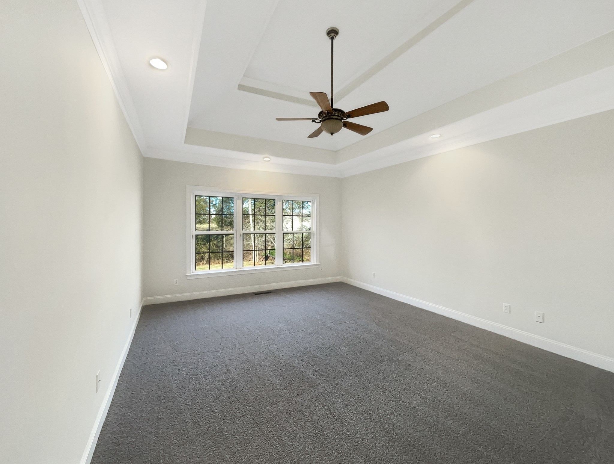 7302 Kempton Court Fairview, TN 37062 - Photo 13 of 28 a view of a livingroom with a ceiling fan and window