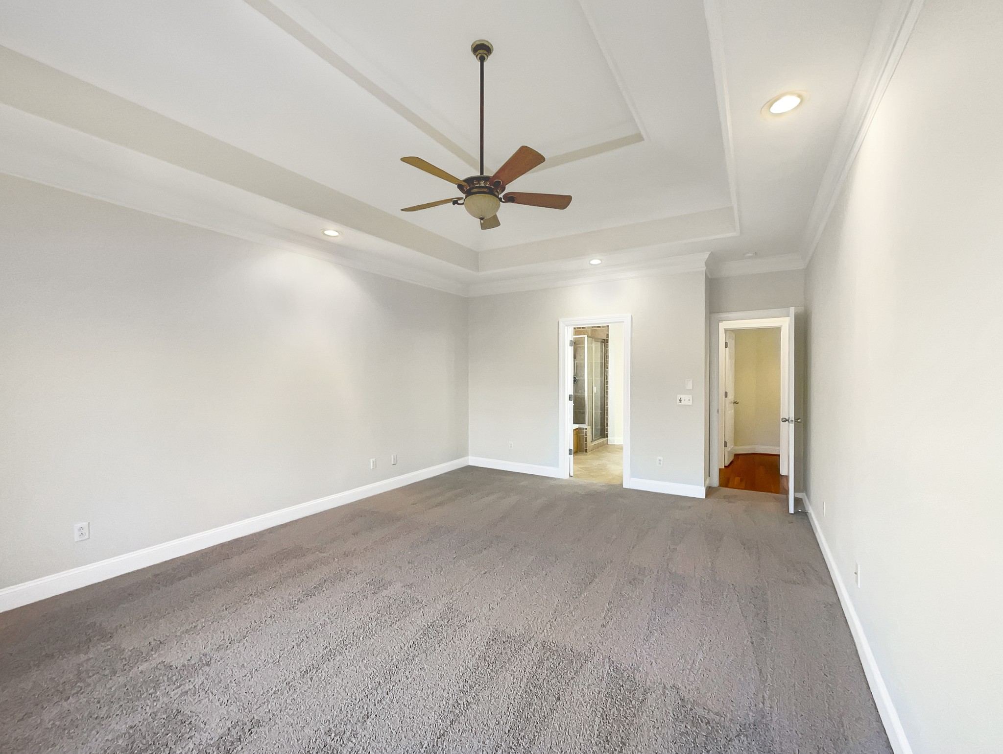 7302 Kempton Court Fairview, TN 37062 - Photo 14 of 28 an empty room and chandelier fan