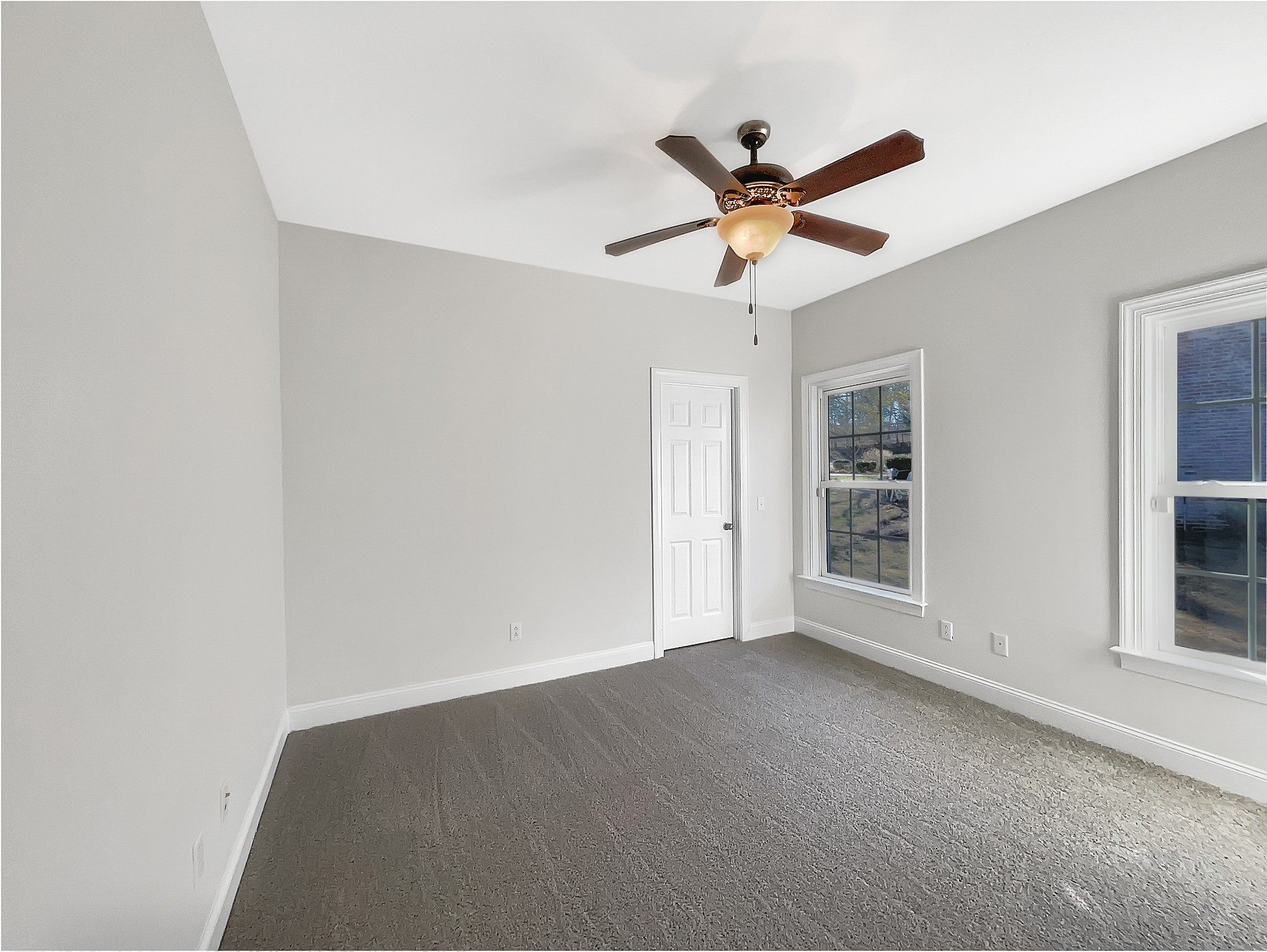 7302 Kempton Court Fairview, TN 37062 - Photo 16 of 28 a view of a livingroom with a ceiling fan and window