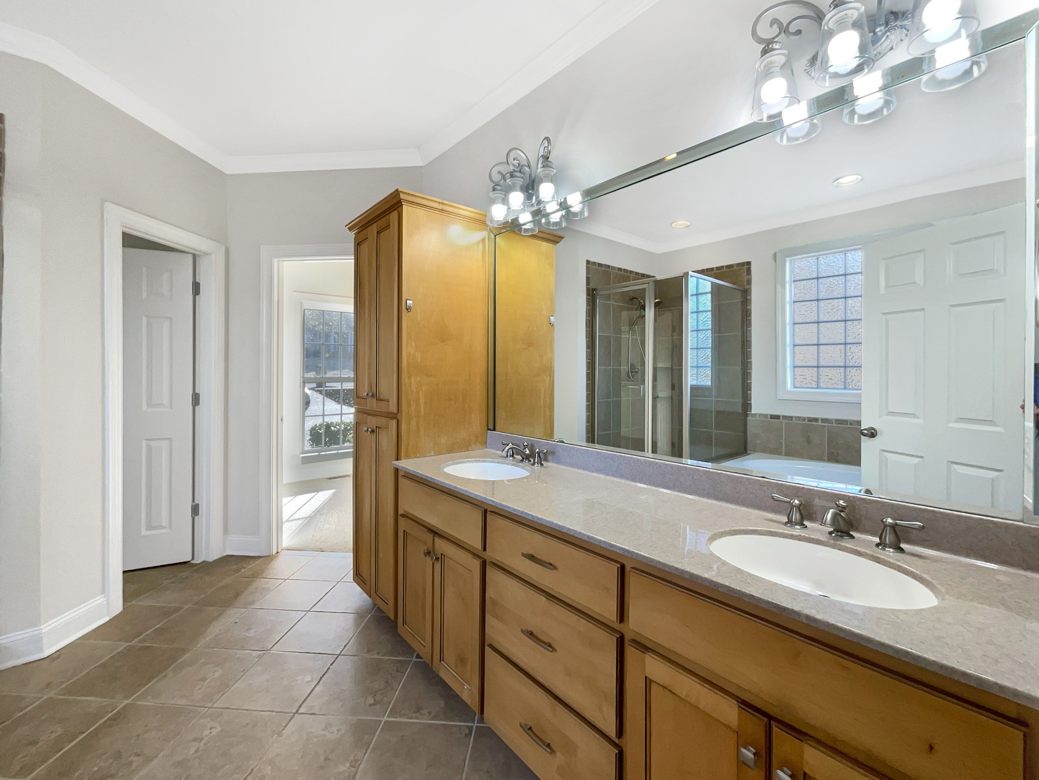 7302 Kempton Court Fairview, TN 37062 - Photo 20 of 28 a spacious bathroom with a double vanity sink mirror and double