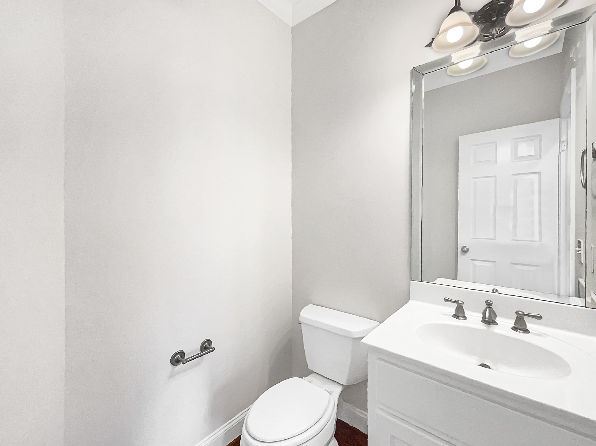 7302 Kempton Court Fairview, TN 37062 - Photo 24 of 28 a bathroom with a sink a toilet and mirror