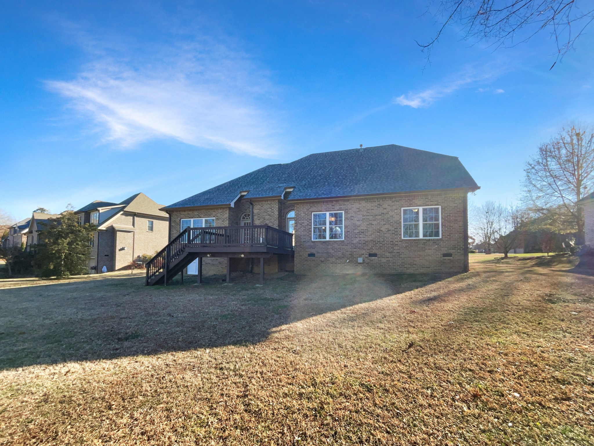 7302 Kempton Court Fairview, TN 37062 - Photo 28 of 28 a view of a yard in front of a house with large trees